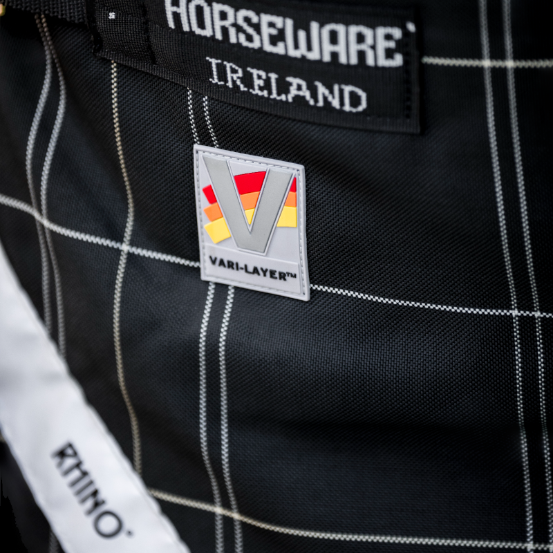 Horseware - Couverture d'extérieur Rhino Wug Turnout VL noir/ gris/ blanc à carreaux 250g | - Ohlala