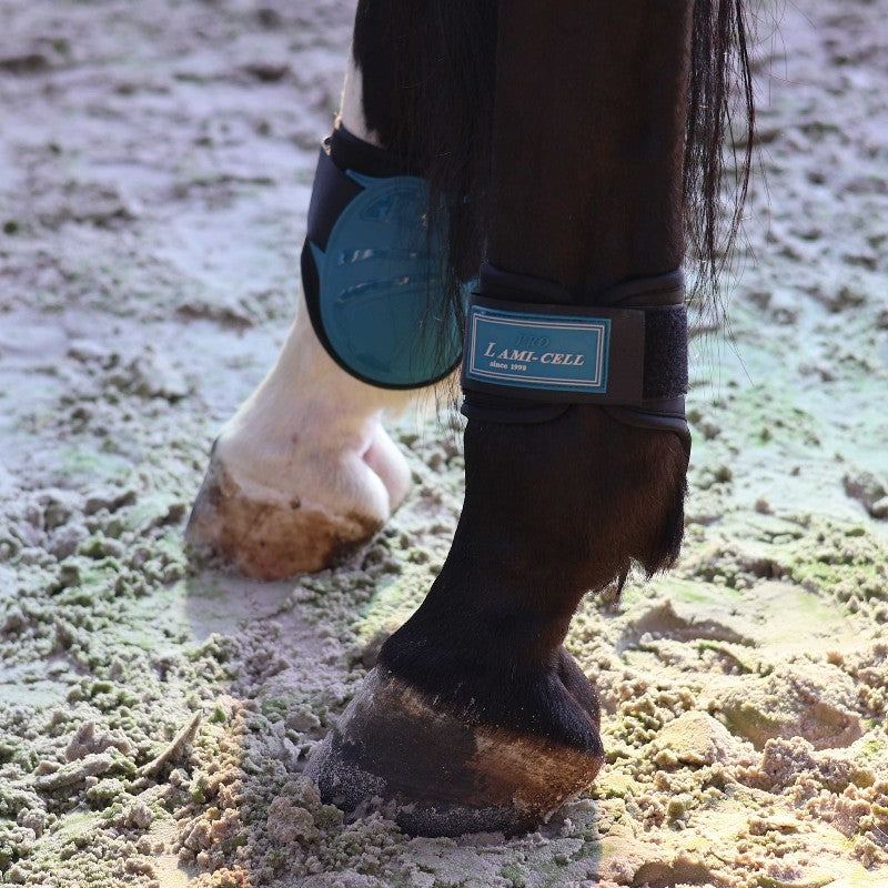 Lami-cell - Elite turquoise gaiters and knee guards